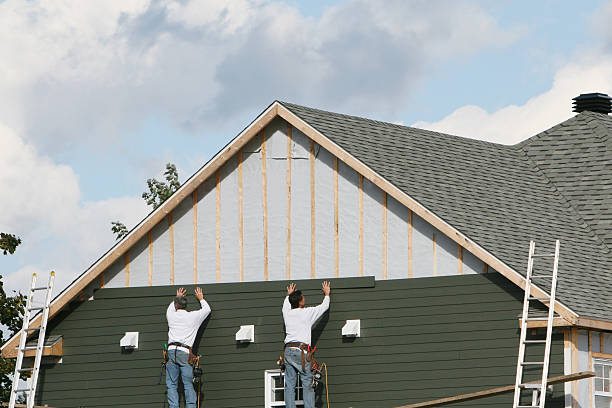 Professional Siding Installation technician working in Logan, WV